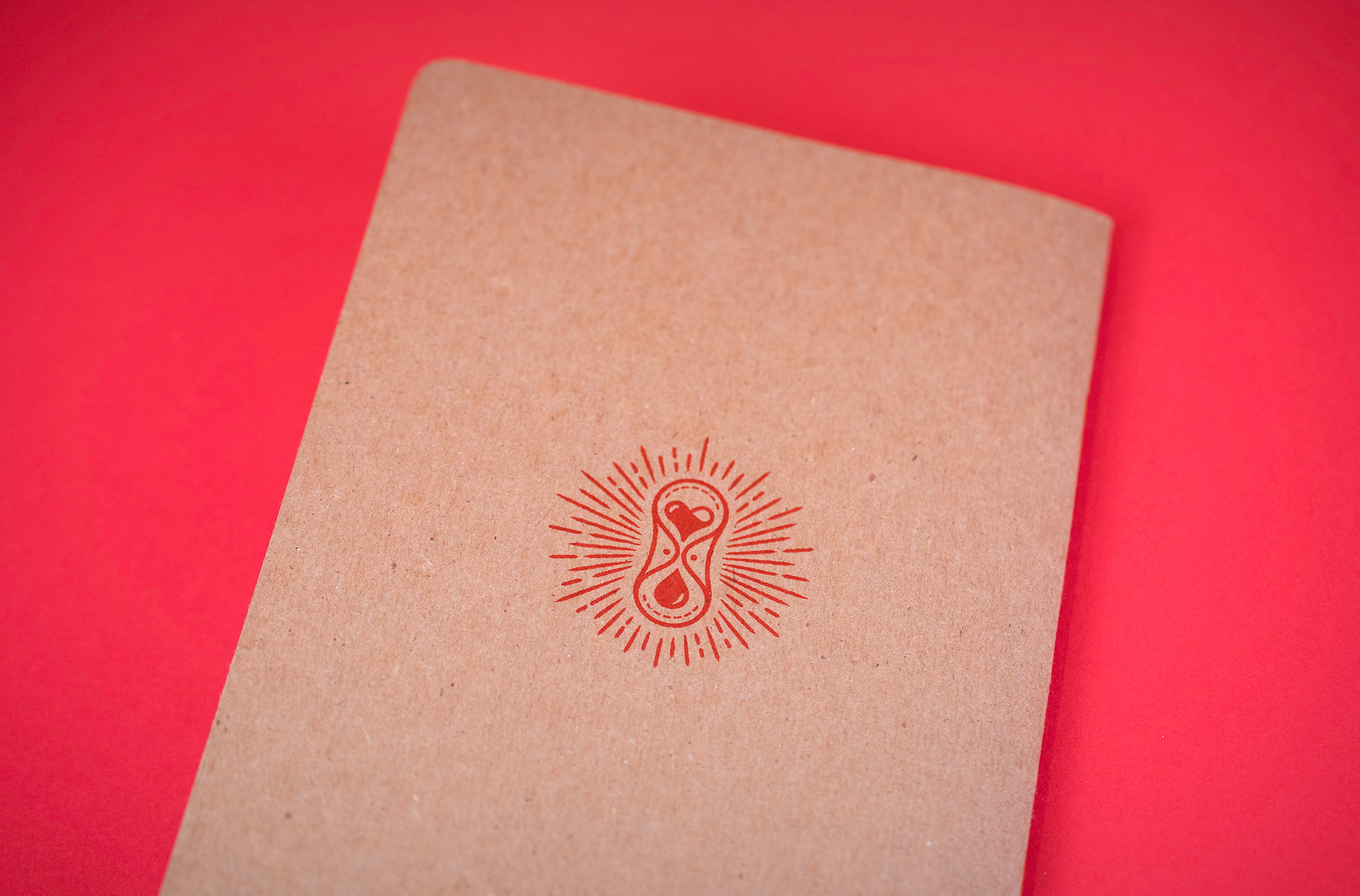 GladRags logo printed on the back of a Scout Book