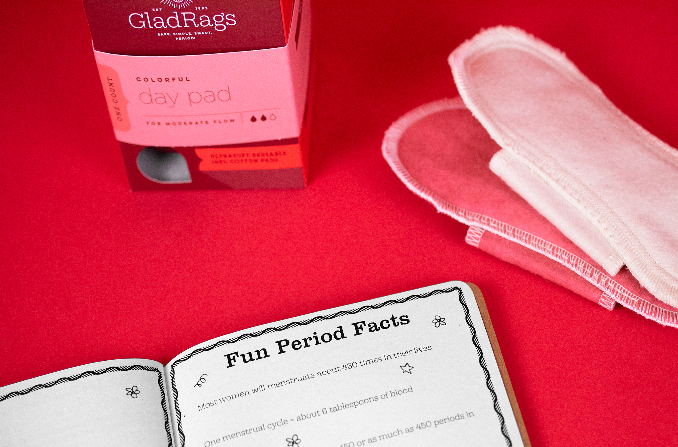 Open Scout Book with menstrual products