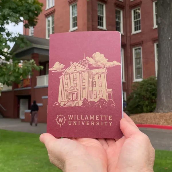 Willamette University Custom Notebook Willamette University Custom Notebook held in front of a university building