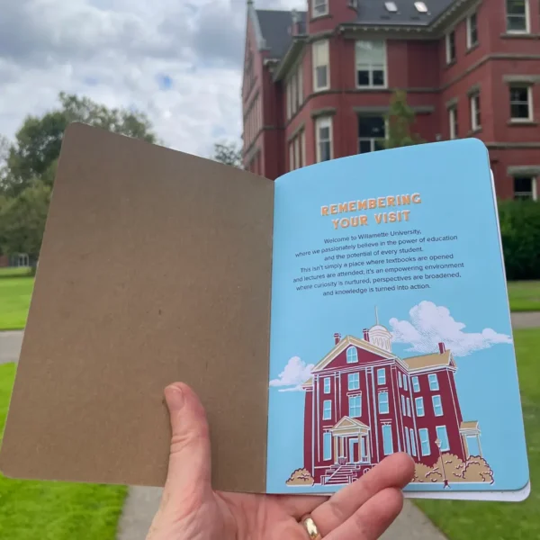 Willamette University Custom Notebook Willamette University Custom Notebook held in front of a university building